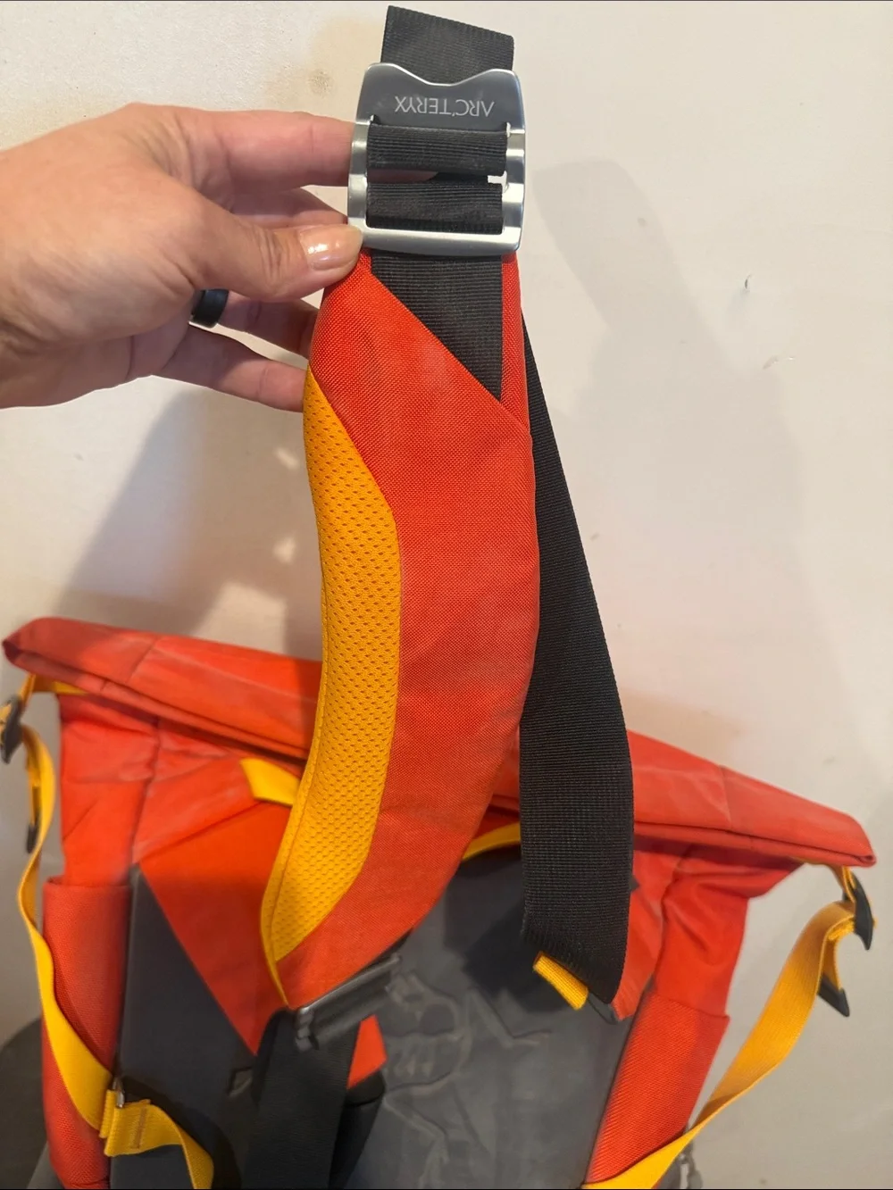Arc'teryx Red Backpack with Yellow Accents